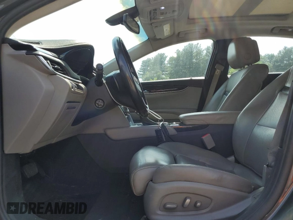 2013 Cadillac XTS Luxury with VIN 2G61P5S34D9212029, listed as a Copart auction lot 61874985 with 145,762 mi miles and Clean title. Bid and sale history available at DreamBid. Image 7.