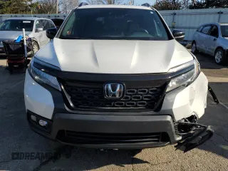 2021 Honda Passport Touring with VIN 5FNYF8H91MB027654, listed as a Copart auction lot 87270244 with 10,481 mi miles and Salvage Title. Bid and sale history available at carsss.com. Image 5.