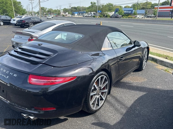 2013 Porsche 911 Carrera S with VIN WP0CB2A97DS154165, listed as a Copart auction lot 56958415 with 99,999 mi miles and Salvage Title. Bid and sale history available at DreamBid. Image 4.