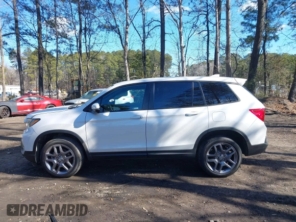 2023 Honda Passport EX-L z VIN 5FNYF8H56PB037470, wystawiony jako IAAI lot #41330084 z przebiegiem Nie podano mil oraz . Historia ofert i sprzedaży dostępna na DreamBid. Obrazek 13.