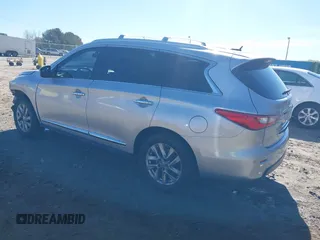 2013 Infiniti JX35 with VIN 5N1AL0MM3DC336945, listed as a IAAI auction lot 41858705 with 114,784 mi miles. Bid and sale history available at carsss.com. Image 3.