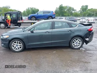 2015 Ford Fusion SE z VIN 1FA6P0HD9F5101925, wystawiony jako IAAI lot #42314400 z przebiegiem 159 548 mil mil oraz . Historia ofert i sprzedaży dostępna na DreamBid. Obrazek 14.
