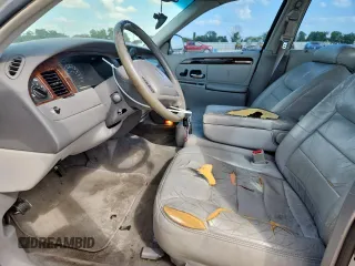 2000 Lincoln Town Car Signature with VIN 1LNHM82W9YY774120, listed as a Copart auction lot 59328725 with 137,910 mi miles and Salvage title. Bid and sale history available at DreamBid. Image 7.