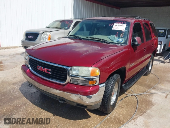 2002 GMC Yukon SLE with VIN 1GKEC13V12R116854, listed as a IAAI auction lot 41799335 with 270,063 mi miles. Bid and sale history available at carsss.com. Image 2.