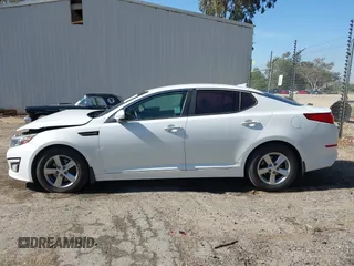 2015 Kia Optima LX with VIN 5XXGM4A76FG456677, listed as a IAAI auction lot 41976831 with 138,008 mi miles. Bid and sale history available at carsss.com. Image 14.