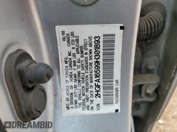 2009 Honda Civic LX z VIN 2HGFA16599H301893, wystawiony jako Copart lot #58815225 z przebiegiem 174 952 mil mil oraz Szkoda całkowita • Salvage title. Historia ofert i sprzedaży dostępna na DreamBid. Obrazek 13.