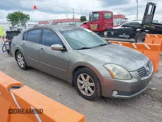 2004 Nissan Maxima SE z VIN 1N4BA41E74C858809, wystawiony jako IAAI lot #42436562 z przebiegiem 198 105 mil mil oraz . Historia ofert i sprzedaży dostępna na DreamBid. Obrazek 1.