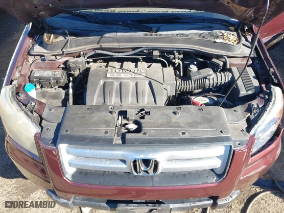 2007 Honda Pilot LX with VIN 2HKYF18167H510970, listed as a IAAI auction lot 40827681 with 119,011 mi miles. Bid and sale history available at carsss.com. Image 10.