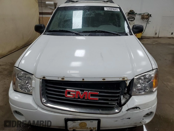 2003 GMC Envoy SLT с VIN 1GKET16S736148082, выставлен на аукционе Copart как лот 53889665 с пробегом 179 774 миль миль и Чистый • Clean title. История ставок и продаж доступна на DreamBid. Изображение 5.