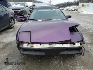 1995 Ford Probe z VIN 1ZVLT22B9S5142588, wystawiony jako Copart lot #89005925 z przebiegiem 83 937 mil mil oraz Szkody całkowita. Historia ofert i sprzedaży dostępna na DreamBid. Obrazek 5.