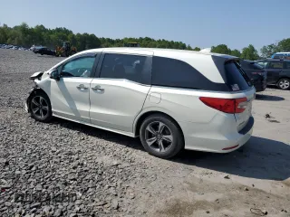 2019 Honda Odyssey Touring with VIN 5FNRL6H81KB051846, listed as a Copart auction lot 58723015 with 68,142 mi miles and Salvage title. Bid and sale history available at DreamBid. Image 2.