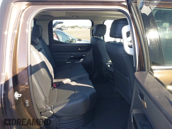 2023 Toyota Tundra Limited Hybrid with VIN 5TFJC5DB7PX032210, listed as a IAAI auction lot 41667443 with 18,390 mi miles and . Bid and sale history available at DreamBid. Image 8.