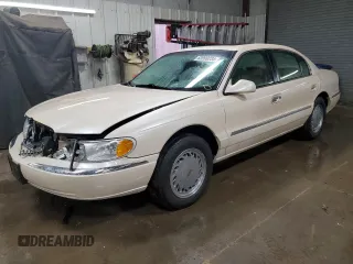 1998 Lincoln Continental with VIN 1LNFM97V9WY604317, listed as a Copart auction lot 83999234 with 91,277 mi miles and Salvage Title. Bid and sale history available at carsss.com. Image 1.