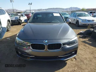 2017 BMW 3 Series 330i with VIN WBA8B9C57HK884847, listed as a IAAI auction lot 41739922 with 38,710 mi miles. Bid and sale history available at carsss.com. Image 13.