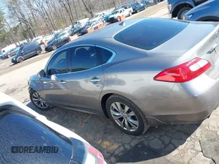 2012 Infiniti M with VIN JN1BY1AP3CM331819, listed as a IAAI auction lot 41773311 with 321,644 mi miles and . Bid and sale history available at DreamBid. Image 14.