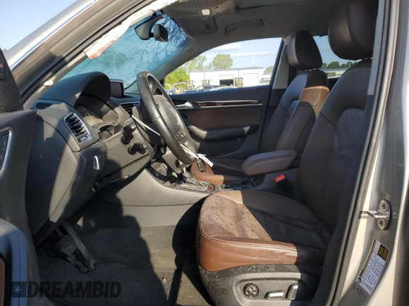 2016 Audi Q3 Prestige z VIN WA1GFCFS1GR009409, wystawiony jako Copart lot #52352845 z przebiegiem Nie podano mil oraz Szkody całkowita. Historia ofert i sprzedaży dostępna na DreamBid. Obrazek 7.