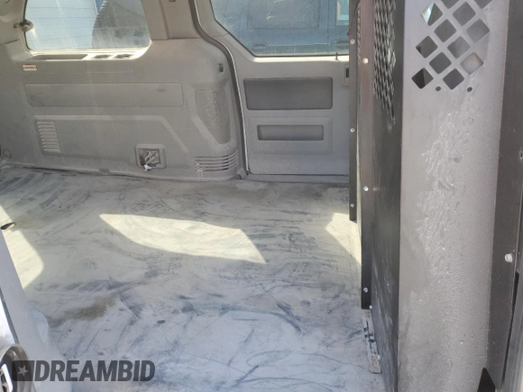 2007 Ford Freestar Cargo z VIN 2FTZA54647BA13617, wystawiony jako Copart lot #52545745 z przebiegiem Nie podano mil oraz Szkody całkowita. Historia ofert i sprzedaży dostępna na DreamBid. Obrazek 11.