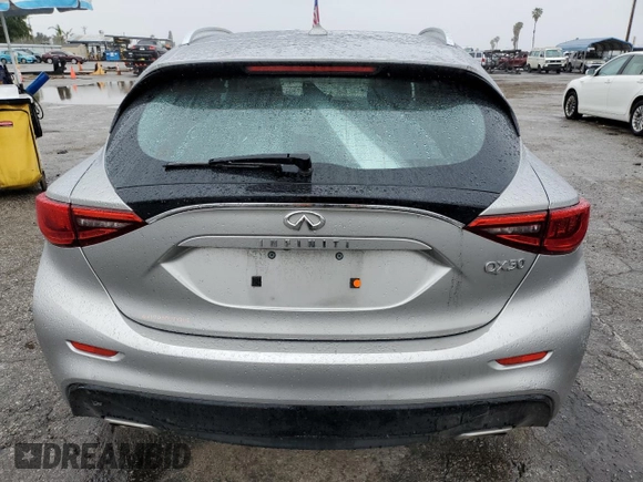 2019 Infiniti QX30 Luxe with VIN SJKCH5CP4KA011380, listed as a Copart auction lot 48665745 with 86,749 mi miles and Salvage title. Bid and sale history available at DreamBid. Image 6.