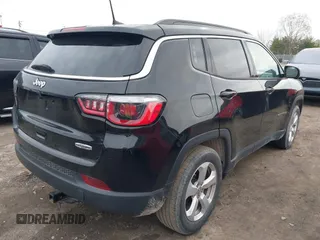 2017 Jeep Compass Latitude with VIN 3C4NJCBB0HT652764, listed as a IAAI auction lot 41963296 with 141,338 mi miles and . Bid and sale history available at DreamBid. Image 4.