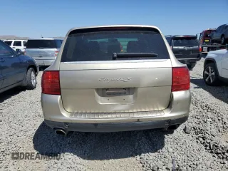 2004 Porsche Cayenne S z VIN WP1AB29P94LA75826, wystawiony jako Copart lot #57920545 z przebiegiem 193 245 mil mil oraz Szkody całkowita. Historia ofert i sprzedaży dostępna na DreamBid. Obrazek 6.