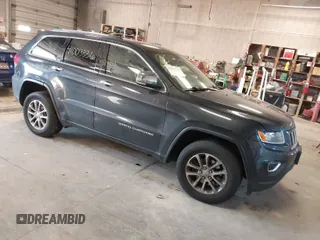 2015 Jeep Grand Cherokee Limited with VIN 1C4RJFBG5FC941811, listed as a IAAI auction lot 41003336 with 137,867 mi miles. Bid and sale history available at carsss.com. Image 1.