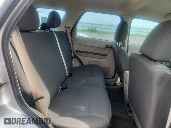 2012 Ford Escape XLS z VIN 1FMCU0C79CKC84677, wystawiony jako Copart lot #64234045 z przebiegiem 138 562 mil mil oraz Czysty tytuł • Clean title. Historia ofert i sprzedaży dostępna na DreamBid. Obrazek 11.