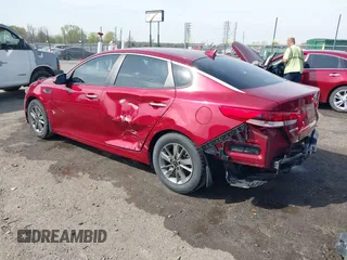 2017 Kia Optima LX 1.6T with VIN 5XXGT4L19HG126532, listed as a IAAI auction lot 41899304 with 130,739 mi miles. Bid and sale history available at carsss.com. Image 3.