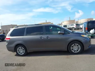2014 Toyota Sienna XLE with VIN 5TDYK3DC2ES438980, listed as a IAAI auction lot 42067750 with 143,728 mi miles and . Bid and sale history available at DreamBid. Image 13.