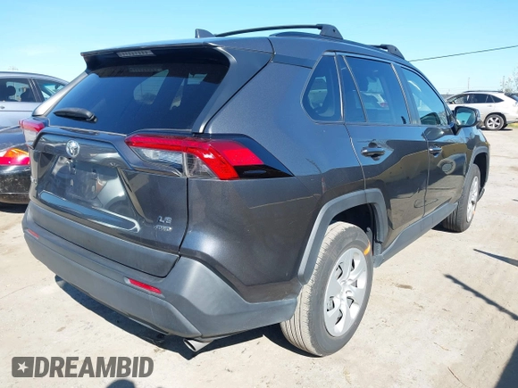 2019 Toyota RAV4 LE with VIN JTMG1RFV3KD025974, listed as a IAAI auction lot 41879264 with 131,933 mi miles and . Bid and sale history available at DreamBid. Image 4.