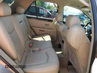 2008 Cadillac SRX RWD z VIN 1GYEE637780164161, wystawiony jako Copart lot #59238545 z przebiegiem 93 717 mil mil oraz Czysty tytuł • Clean title. Historia ofert i sprzedaży dostępna na DreamBid. Obrazek 11.