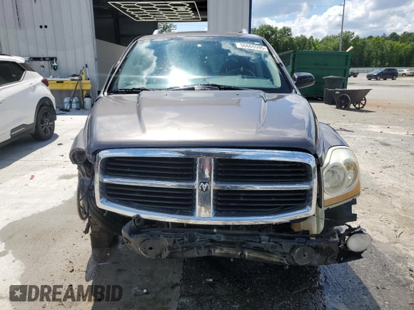 2004 Dodge Durango SLT with VIN 1D4HD48NX4F167468, listed as a Copart auction lot 56665595 with 275,747 mi miles and Salvage title. Bid and sale history available at DreamBid. Image 5.