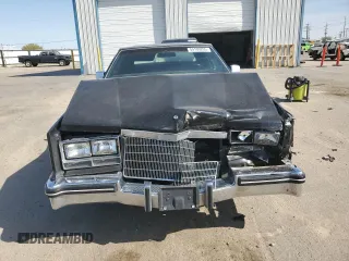 1985 Cadillac Eldorado z VIN 1G6EL5780FE622179, wystawiony jako Copart lot #54109205 z przebiegiem 73 403 mil mil oraz Szkoda całkowita • Salvage title. Historia ofert i sprzedaży dostępna na DreamBid. Obrazek 5.