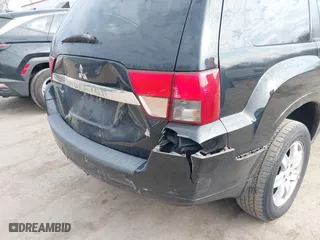 2011 Mitsubishi Endeavor LS with VIN 4A4JN2AS7BE026322, listed as a IAAI auction lot 41709375 with 230,701 mi miles. Bid and sale history available at carsss.com. Image 6.