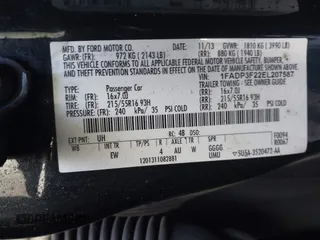 2014 Ford Focus SE with VIN 1FADP3F22EL207587, listed as a IAAI auction lot 41818555 with 119,811 mi miles. Bid and sale history available at carsss.com. Image 9.