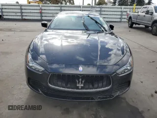 2015 Maserati Ghibli z VIN ZAM57XSA5F1129866, wystawiony jako Copart lot #51738015 z przebiegiem Nie podano mil oraz Szkoda całkowita • Salvage title. Historia ofert i sprzedaży dostępna na DreamBid. Obrazek 5.