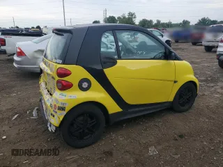 2013 Smart fortwo Pure z VIN WMEEJ3BA2DK663432, wystawiony jako Copart lot #63203755 z przebiegiem 79 786 mil mil oraz Czysty tytuł • Clean title. Historia ofert i sprzedaży dostępna na DreamBid. Obrazek 3.