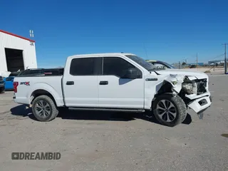 2019 Ford F-150 XL with VIN 1FTEW1EP9KKD25205, listed as a IAAI auction lot 41158627 with 179,259 mi miles and . Bid and sale history available at DreamBid. Image 13.