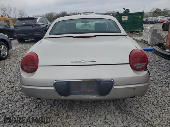 2004 Ford Thunderbird Deluxe z VIN 1FAHP60A84Y104551, wystawiony jako Copart lot #49170085 z przebiegiem 159 696 mil mil oraz Szkoda całkowita • Salvage title. Historia ofert i sprzedaży dostępna na DreamBid. Obrazek 6.