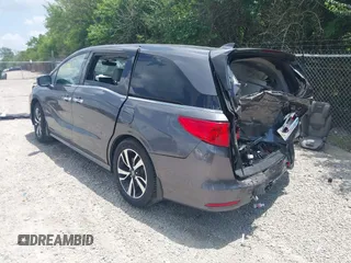 2018 Honda Odyssey Elite with VIN 5FNRL6H95JB087952, listed as a IAAI auction lot 42579817 with 96,577 mi miles and . Bid and sale history available at DreamBid. Image 3.