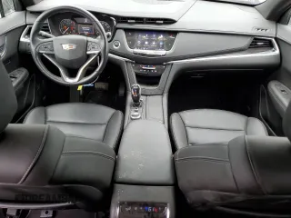 2023 Cadillac XT6 FWD Luxury z VIN 1GYKPAR47PZ147139, wystawiony jako Copart lot #50783595 z przebiegiem 27 684 mil mil oraz Szkoda całkowita • Salvage title. Historia ofert i sprzedaży dostępna na DreamBid. Obrazek 8.