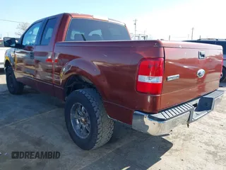 2006 Ford F-150 STX with VIN 1FTRX12W96KC21233, listed as a IAAI auction lot 41959711 with 312,198 mi miles. Bid and sale history available at carsss.com. Image 3.