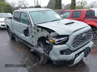 2022 Toyota Tacoma SR with VIN 3TYCZ5AN0NT091323, listed as a IAAI auction lot 41551438 with 24,073 mi miles and . Bid and sale history available at DreamBid. Image 1.