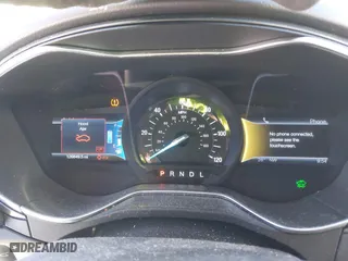 2014 Ford Fusion Titanium Hybrid with VIN 3FA6P0RUXER289087, listed as a IAAI auction lot 41418491 with 126,849 mi miles. Bid and sale history available at carsss.com. Image 7.
