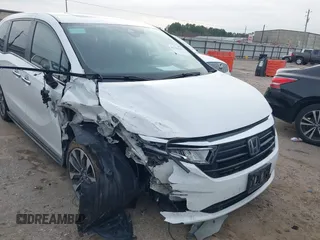 2022 Honda Odyssey EX-L with VIN 5FNRL6H7XNB047791, listed as a IAAI auction lot 41322565 with 174,498 mi miles and . Bid and sale history available at DreamBid. Image 6.
