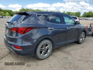 2018 Hyundai Santa Fe 2.4L z VIN 5XYZTDLB4JG521026, wystawiony jako Copart lot #56563175 z przebiegiem 173 170 mil mil oraz Czysty tytuł • Clean title. Historia ofert i sprzedaży dostępna na DreamBid. Obrazek 3.