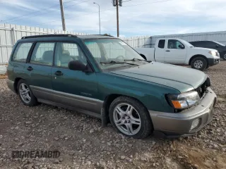 1999 Subaru Forester S with VIN JF1SF6550XH706594, listed as a Copart auction lot 76917554 with 215,297 mi miles and Clean Title. Bid and sale history available at carsss.com. Image 4.