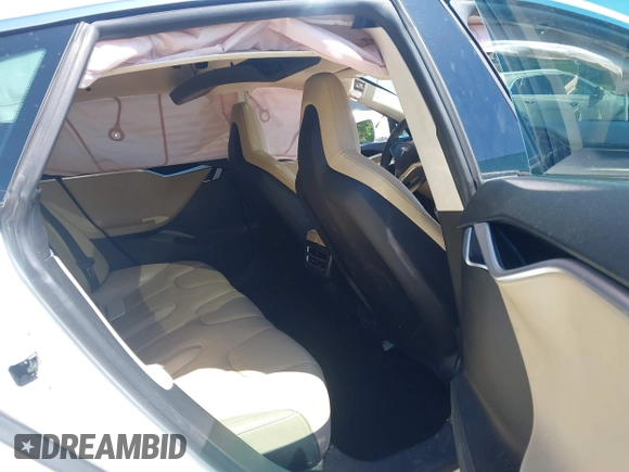 2013 Tesla Model S z VIN 5YJSA1CN6DFP21076, wystawiony jako IAAI lot #41984834 z przebiegiem 154 662 mil mil oraz . Historia ofert i sprzedaży dostępna na DreamBid. Obrazek 8.