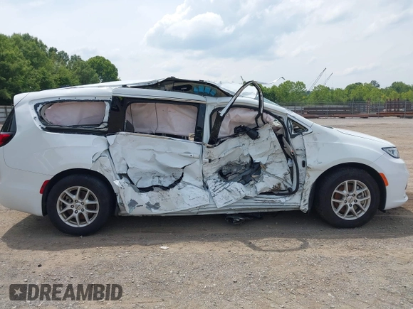 2023 Chrysler Pacifica Touring L with VIN 2C4RC1BGXPR531396, listed as a IAAI auction lot 42492340 with Not provided miles and . Bid and sale history available at DreamBid. Image 13.