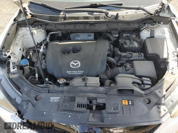 2015 Mazda CX-5 Touring with VIN JM3KE4CYXF0445980, listed as a Copart auction lot 55224355 with 183,713 mi miles and Salvage Title. Bid and sale history available at DreamBid. Image 12.