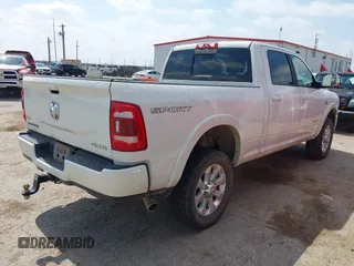 2022 Ram 2500 Laramie with VIN 3C6UR5FL0NG143918, listed as a IAAI auction lot 42373907 with 91,918 mi miles and . Bid and sale history available at DreamBid. Image 4.